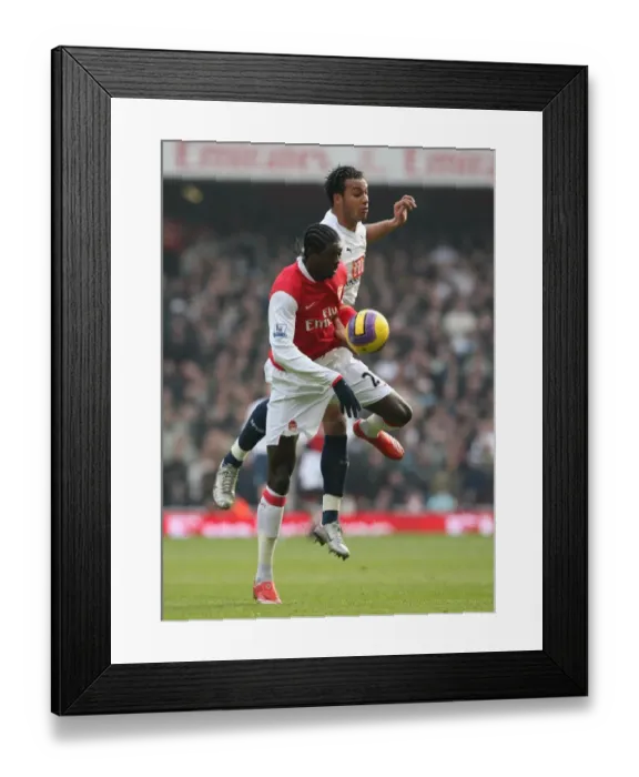 Framed Print : Emmanuel Adebayor (Arsenal) Younes Kaboul (Tottenham) Framed Print : Emmanuel Adebayor (Arsenal) Younes Kaboul (Tottenham)