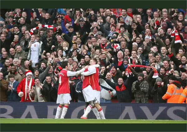 Nicklas Bendtner celebrates scoring the 2nd Arsenal goal with Cesc Fabregas