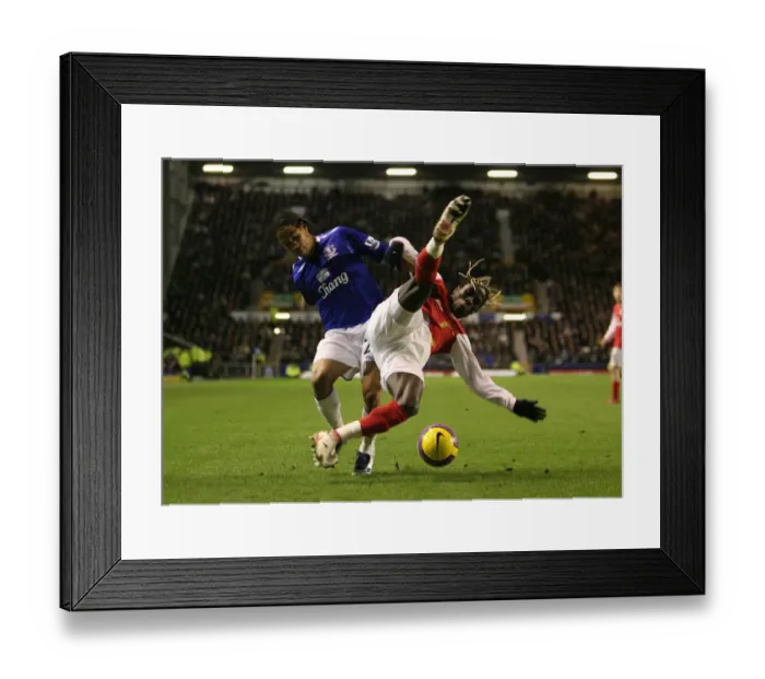 Framed Print : Arsenal's Sagna and Pienaar Clash in Dominant 4-1 Premier League Victory at Everton, 2007 Framed Print : Arsenal's Sagna and Pienaar Clash in Dominant 4-1 Premier League Victory at Everton, 2007