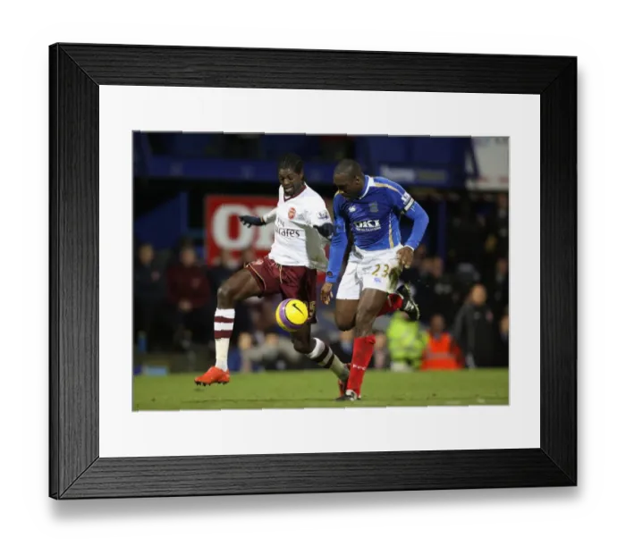 Framed Print : Emmanuel Adebayor (Arsenal) Sol Campbell (Portsmouth)