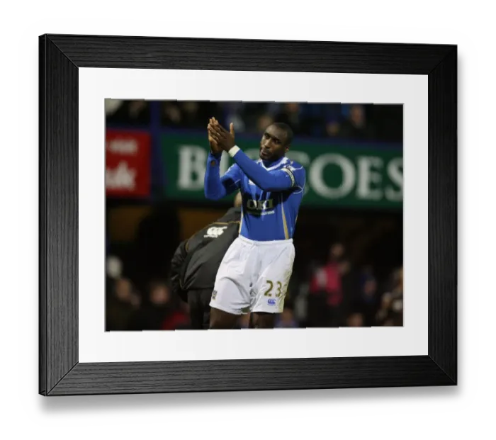 Framed Print : Ex Arsenal player Sol Campbell salutes the arsenal fans during the match