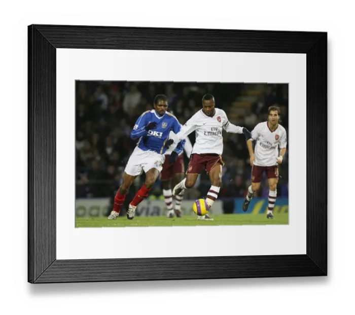  : William Gallas (Arsenal) Lauren (Portsmouth)