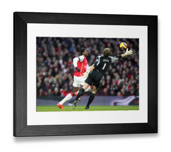 Framed Print : Emmanuel Adebayor rounds Robert Green (West Ham) on his way to scoring Arsenals 2nd goal