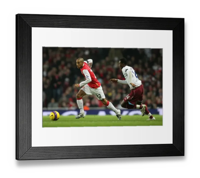 Framed Print : Gael Clichy (Arsenal) John Pantsil (West Ham)
