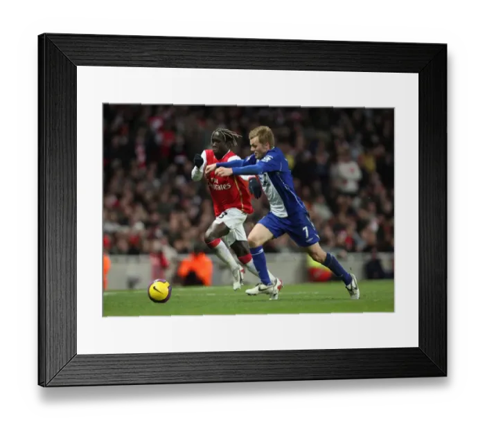 Framed Print : Bacary Sagna (Arsenal) Seb Larsson (Birmingham) Framed Print : Bacary Sagna (Arsenal) Seb Larsson (Birmingham)