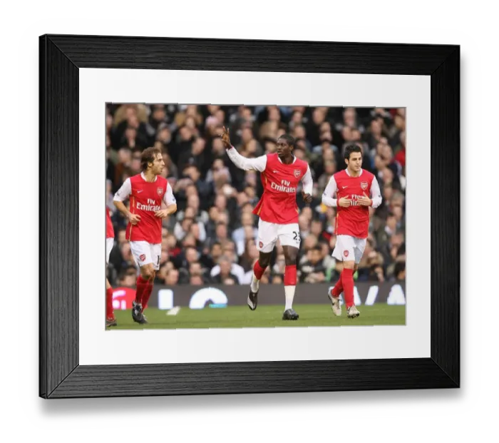 Framed Print : Adebayor's Triumph: The Unforgettable Moment of Arsenal's 3-0 Victory Over Fulham (01.19.08)