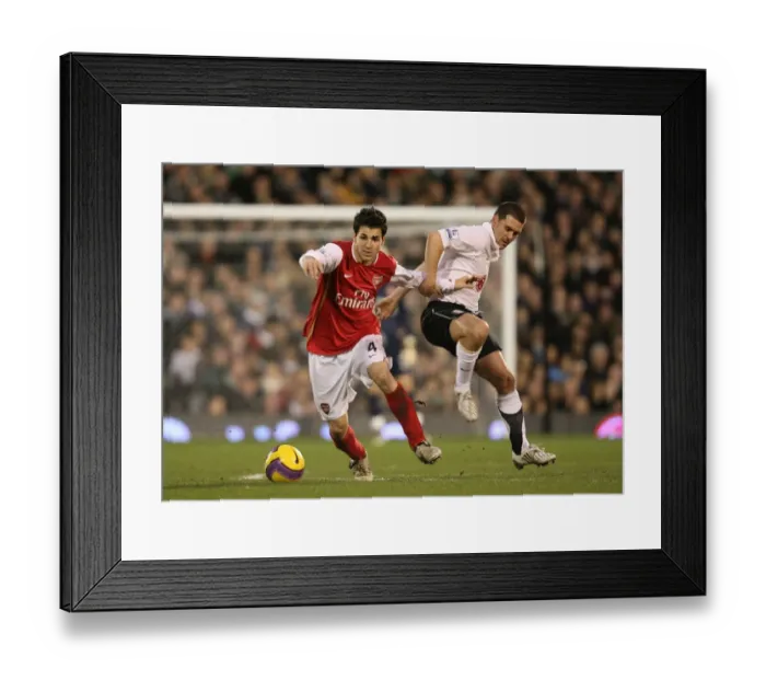 Framed Print : Triumphant Cesc Fabregas Scores Twice Against Fulham in Arsenal's 3-0 Victory