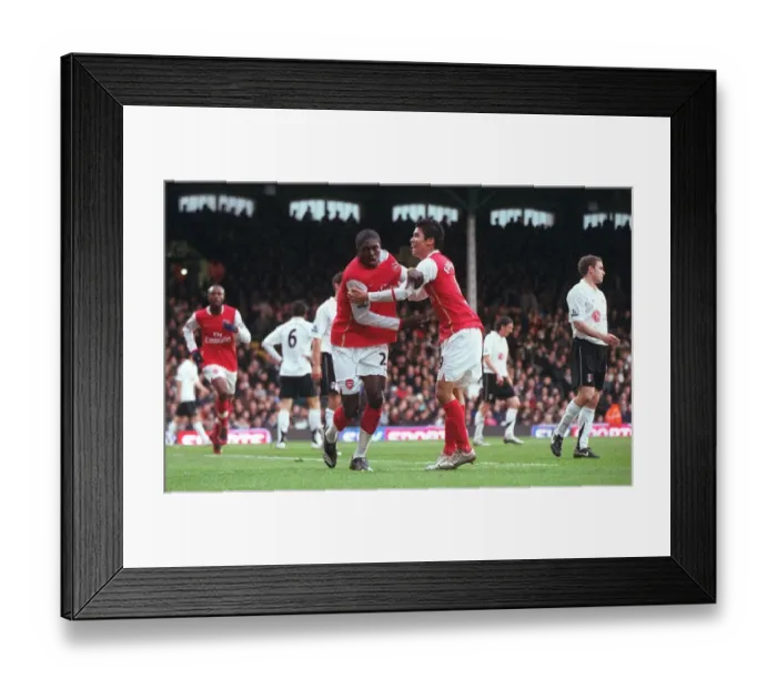 Framed Print : Adebayor and Eduardo: Double Trouble - Arsenal's Unforgettable Goal Celebration vs. Fulham (2007)