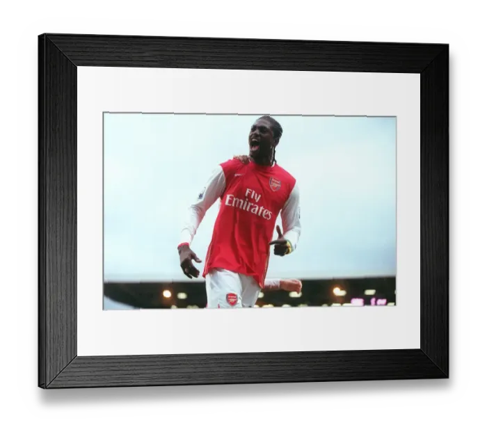 Framed Print : Adebayor's Brilliant Double: Arsenal Crushes Fulham 3-0 in Premier League