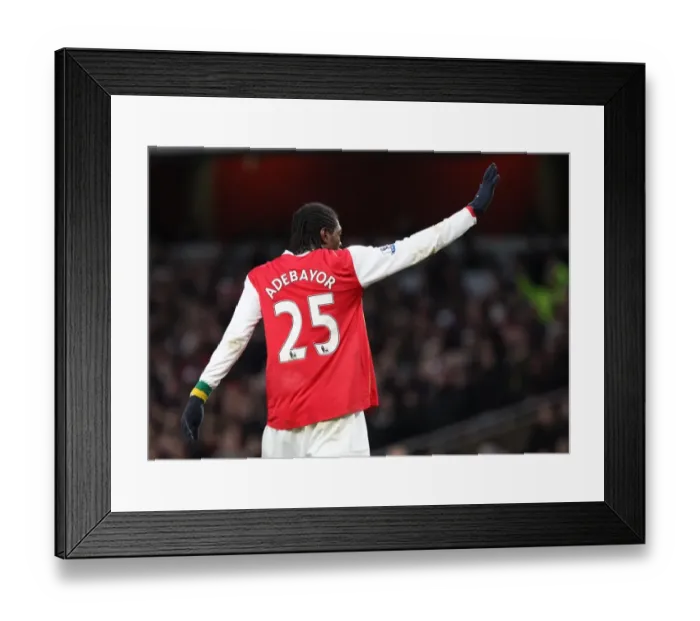 Framed Print : Emmanuel Adebayor waves to the fans after scoring his 2nd goal Framed Print : Emmanuel Adebayor waves to the fans after scoring his 2nd goal