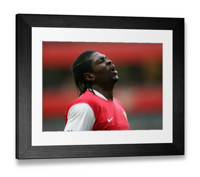 Framed Print : Adebayor's Hat-Trick: Arsenal Crushes Newcastle 3-0 in FA Cup