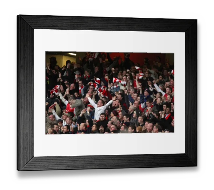 Framed Print : The Arsenal fans celebrate Emmanuel Adebayors 1st goal