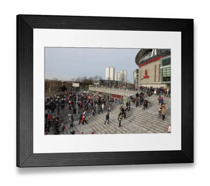 Framed Print : Fans gather outsie the stadium before the match Framed Print : Fans gather outsie the stadium before the match