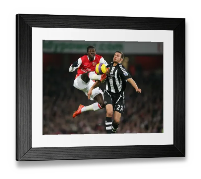 Framed Print : Emmanuel Adebayor (Arsenal) Steven Taylor (Newcastle United)