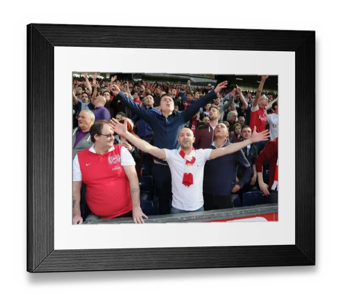 Framed Print : Arsenal Fans Celebrate Victory over West Bromwich Albion in Premier League Match Framed Print : Arsenal Fans Celebrate Victory over West Bromwich Albion in Premier League Match