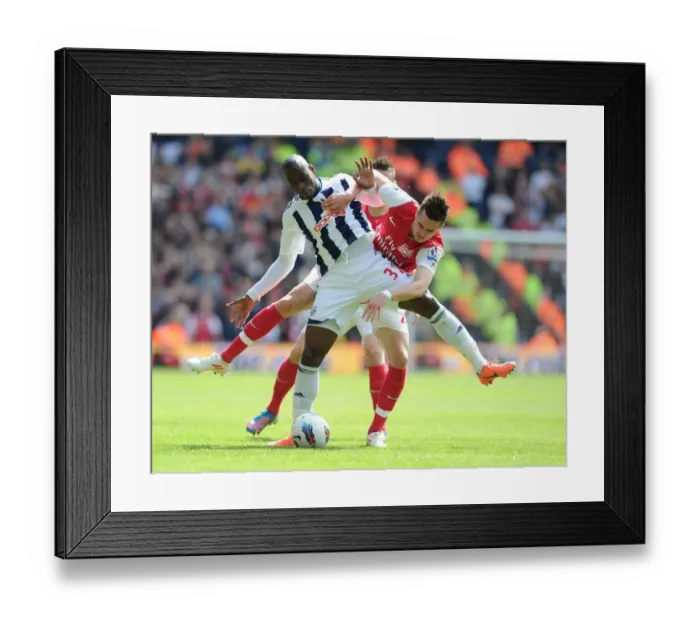 Framed Print : Clash at The Hawthorns: Jenkinson vs. Fortune in Premier League Battle