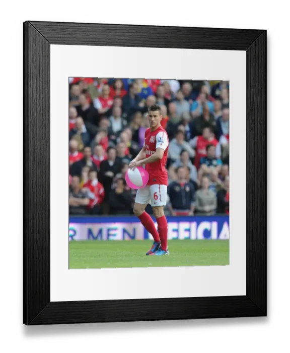 Framed Print : Laurent Koscielny Focuses in Arsenal's 2011-12 Premier League Clash vs. West Bromwich Albion