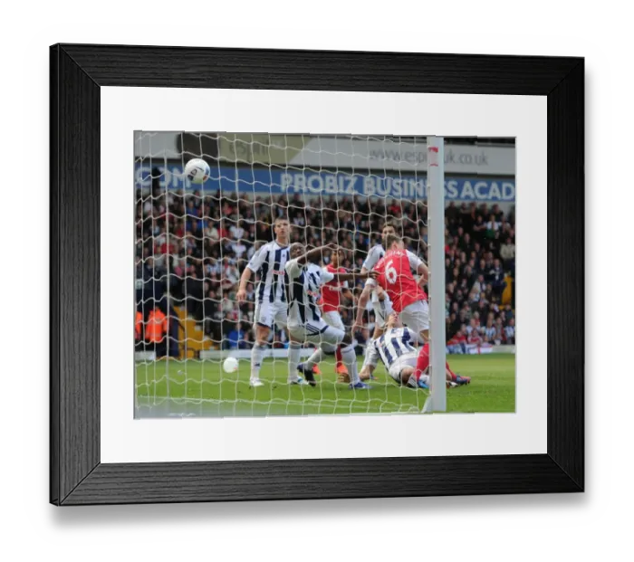 Framed Print : Koscielny's Header: The Decisive Goal That Secured Arsenal's Victory Over West Bromwich Albion (2011-12)