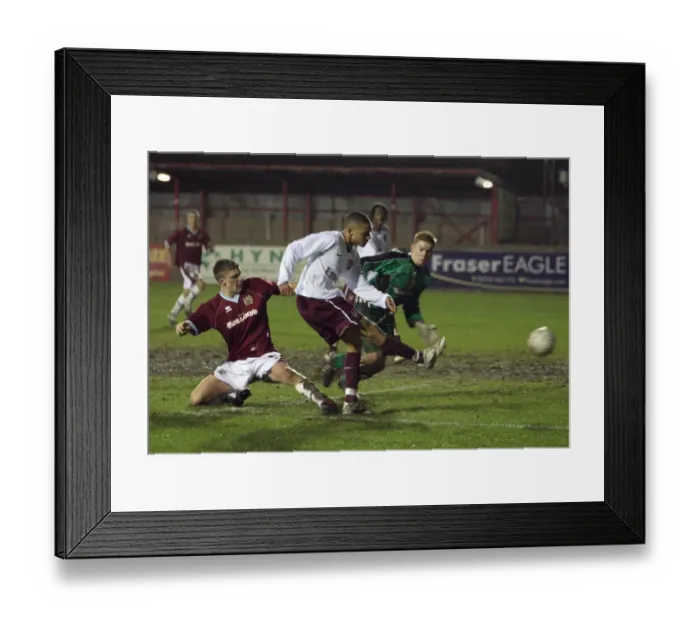 Framed Print : Kieran Gibbs scores Arsenals 3rd goal past Daniel MacDonald (Burnley) Framed Print : Kieran Gibbs scores Arsenals 3rd goal past Daniel MacDonald (Burnley)