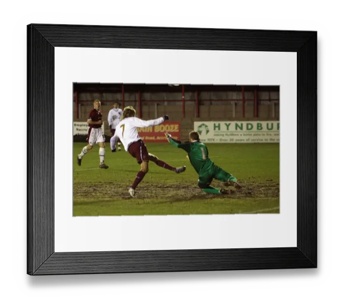 Framed Print : Henri Lansbury scores his and Arsenals 1st goal past Daniel MacDonald (Burnley) Framed Print : Henri Lansbury scores his and Arsenals 1st goal past Daniel MacDonald (Burnley)