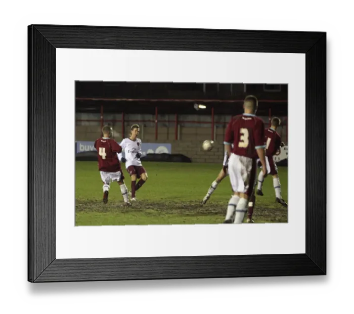 Framed Print : Mark Randall Scores Arsenal's Second Goal Amidst Pressure from Burnley's Alex Ray Harvey in FA Youth Cup Match