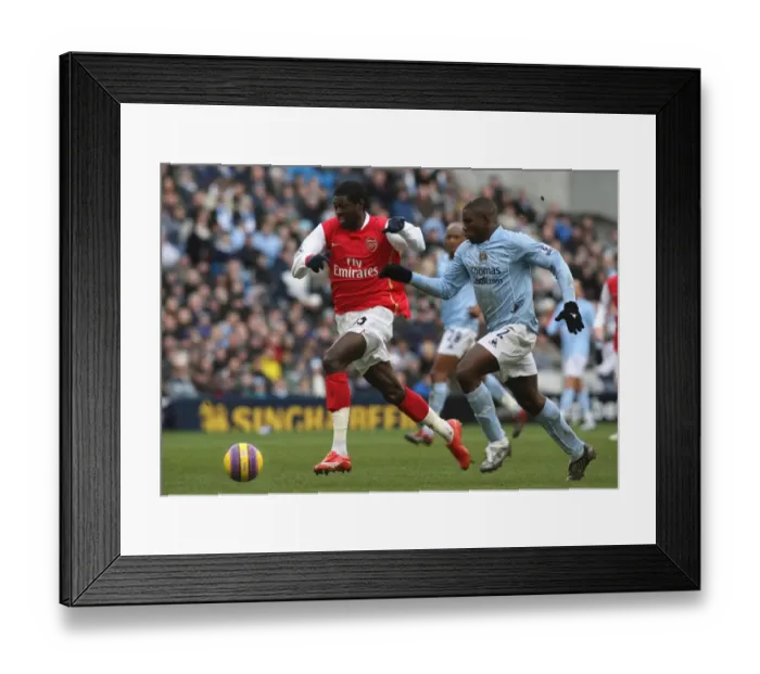 Framed Print : Emmanuel Adebayor (Arsenal) Micah Richards (Manchester City)