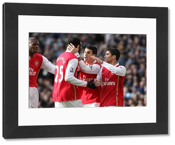 Eduardo celebrares scoring the 2nd Arsenal goal with Cesc Fabregas and Emmanuel Adebayor