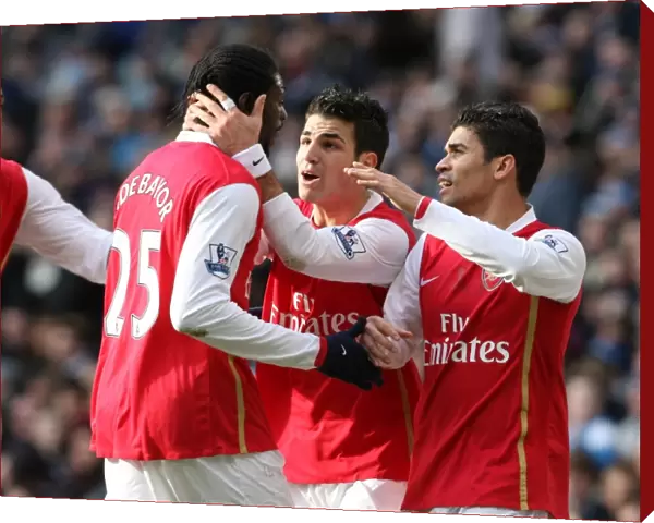 Eduardo celebrares scoring the 2nd Arsenal goal with Cesc Fabregas and Emmanuel Adebayor