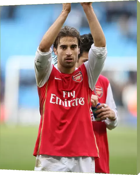 Mathieu Flamini salutes the Arsenal after the match