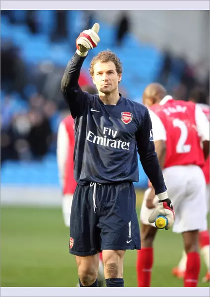 Jens Lehmann salutes the Arsenal fans after the match