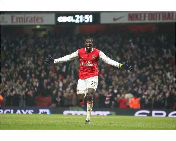 Emmauel Adebayor celebrates scoring the 2nd Arsenal goal