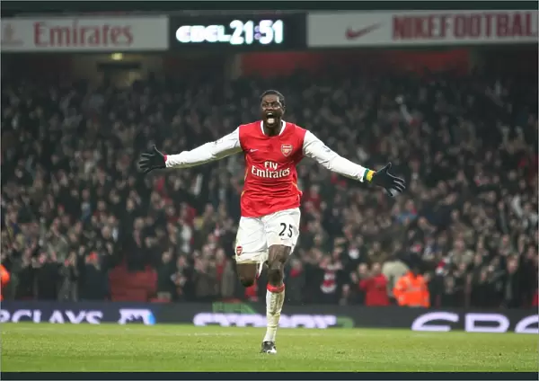 Emmauel Adebayor celebrates scoring the 2nd Arsenal goal