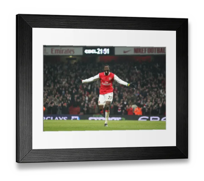 Framed Print : Emmauel Adebayor celebrates scoring the 2nd Arsenal goal