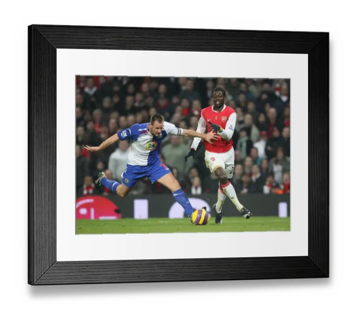 Framed Print : Emmauel Adebayor (Arsenal) Andre Ooijer (Blackburn Rovers) Framed Print : Emmauel Adebayor (Arsenal) Andre Ooijer (Blackburn Rovers)