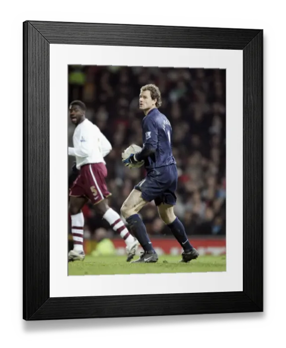 Framed Print : Arsenal's Jens Lehmann Endures Humbling 4-0 Defeat Against Manchester United in FA Cup Framed Print : Arsenal's Jens Lehmann Endures Humbling 4-0 Defeat Against Manchester United in FA Cup