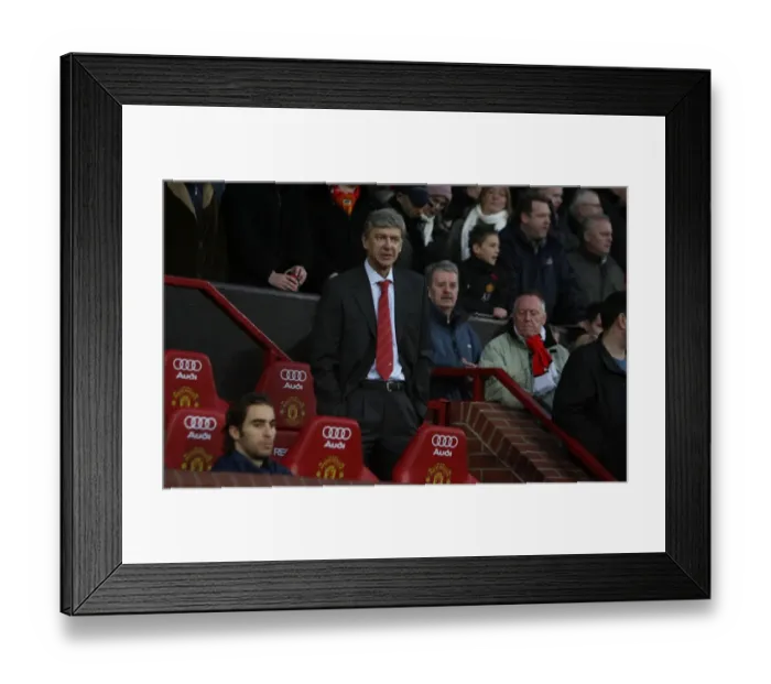 Framed Print : Arsene Wenger: Defiant at Old Trafford Amidst Manchester United's 4-0 FA Cup Victory
