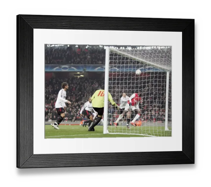Framed Print : Emmanuel Adebayor (Arsenal) heads against the cross bar Framed Print : Emmanuel Adebayor (Arsenal) heads against the cross bar