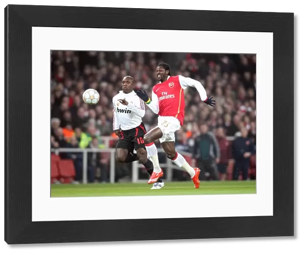 Emmanuel Adebayor (Arsenal) Clarence Seedorf (Milan)