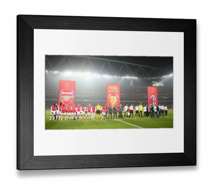 Framed Print : Arsenal and AC Milan line up before the match Framed Print : Arsenal and AC Milan line up before the match