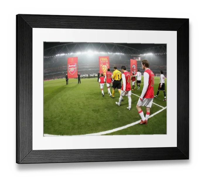 Framed Print : Arsenal Players Take the Field against AC Milan in UEFA Champions League at Emirates Stadium, 2008