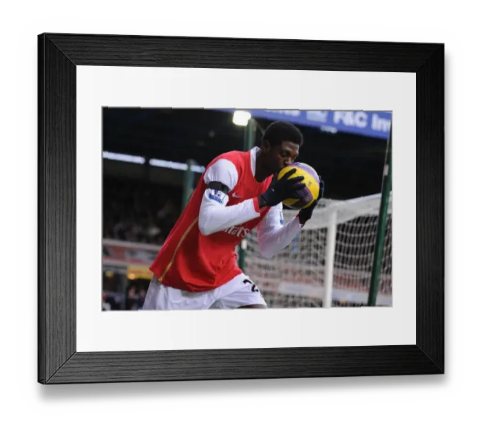 Framed Print : Adebayor's Emotional Matchball Moment: Arsenal vs. Birmingham, 2008