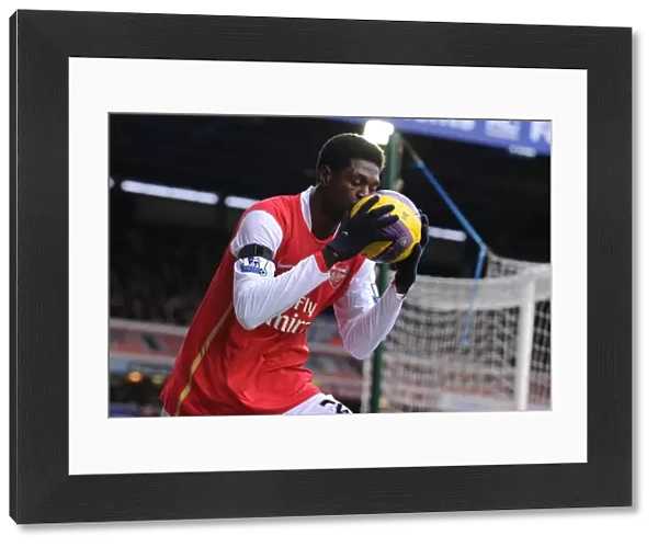 Emmanuel Adebayor (Arsenal) kisses the matchball
