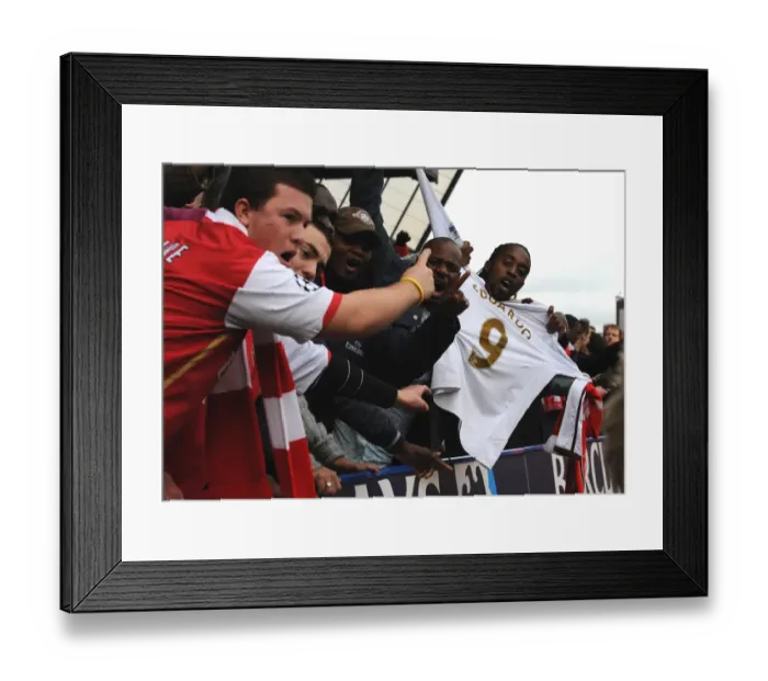 Framed Print : Arsenal fans show their respect for injured Arsenal striker Eduardo Framed Print : Arsenal fans show their respect for injured Arsenal striker Eduardo