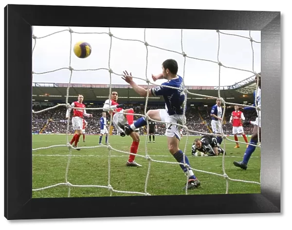 Theo Walcott shoots past Damien Johnson to score the 1st Arsenal goal