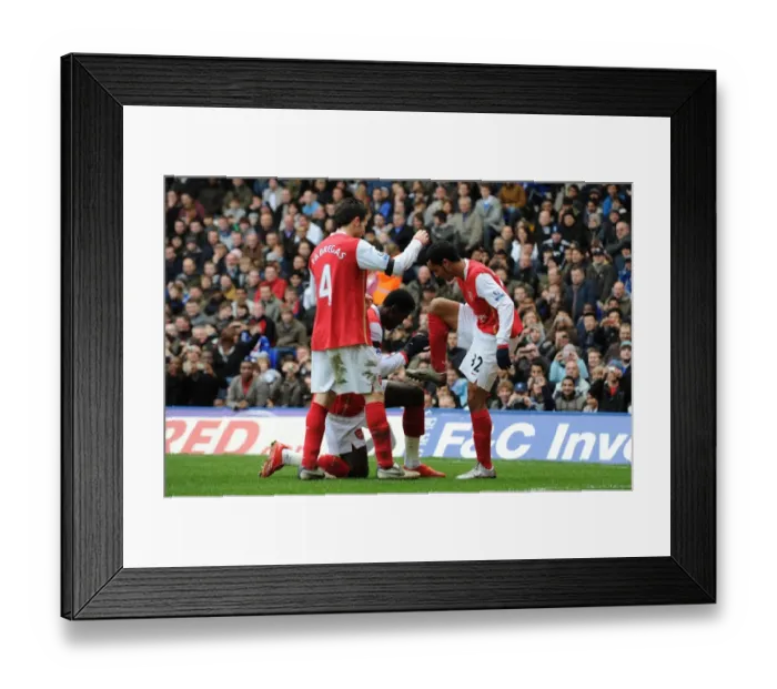 Framed Print : Theo Walcott's Double: A Celebration with Fabregas and Adebayor