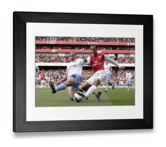 Framed Print : Theo Walcott (Arsenal) Curtis Davies (Villa) Framed Print : Theo Walcott (Arsenal) Curtis Davies (Villa)