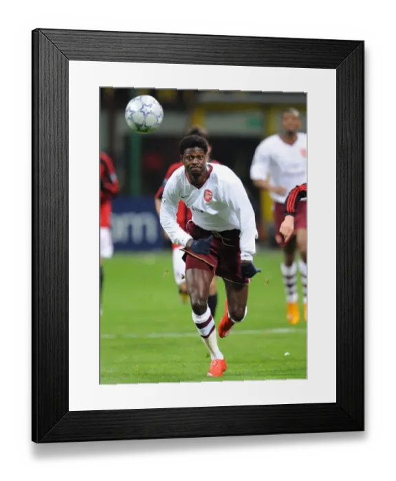 Framed Print : Adebayor's Brilliance: Arsenal's Unforgettable 2-0 Victory Over AC Milan in the Champions League