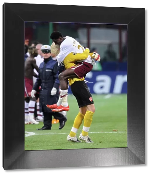 Adebayor and Almunia: Arsenal's Champions League Victory Celebration at San Siro Stadium