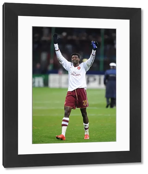Emmanuel Adebayor celebrates Arsenals victory