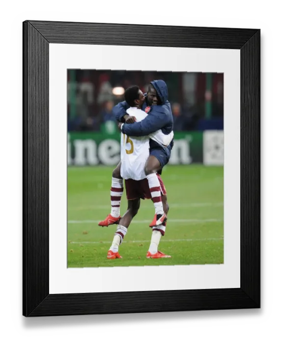 Framed Print : Emmanuel Adebayor and Emmanuel Eboue celebrate Arsenals victory Framed Print : Emmanuel Adebayor and Emmanuel Eboue celebrate Arsenals victory